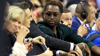 WTF Was Up With Dwyane Wade’s Dewy Hair and Outfit?